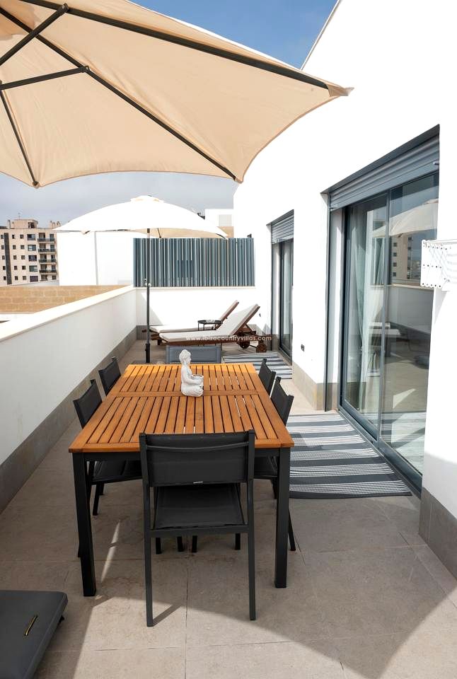 Foto 12 van Duplex penthouse apartment in Playa den Bossa